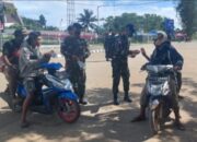 Pembagian Masker Dan Sosialisasi Protokol Kesehatan Oleh Anggota Satgas Pamtas RI-PNG Yonif 711/Raksatama