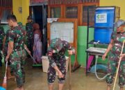Personel Sargas Pamtas RI-PNG Yonif 711/Raksatama Melaksanakan Kerja Bhakti Pasca Banjir di Jayapura