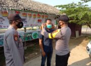 Polsek Pangkalan Lesung Bagikan Masker Gratis ke Masyarakat
