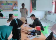 Bertempat di Balai Desa Serapung Pelaksanaan Vaksinasi Dikawal Polsek Kuala Kampar