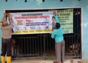 Ajak Warga Sadar Vaksin Polsek Langgam Pasang Spanduk di Lokasi Strategis