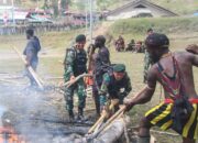 Bakar Batu Sambut Pemilu Damai di Sinak Papua