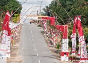 Warga Desa Meranti Penuh Semangat Sambut HUT RI ke-79 dengan Pemasangan Umbul-Umbul